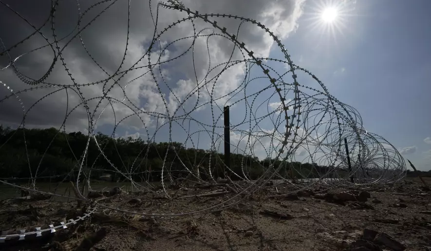Texas’ razor wire border fence